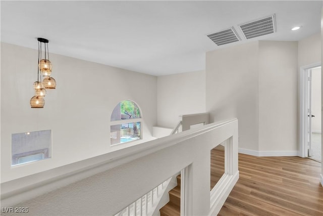 10613 Turquoise Valley Dr, Las Vegas, NV 89144 - corridor with recessed lighting, baseboards, visible vents, and wood finished floors