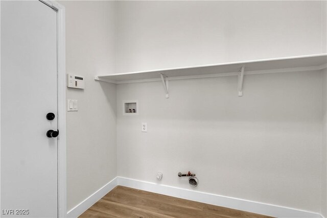 10613 Turquoise Valley Dr, Las Vegas, NV 89144 - washroom with wood finished floors, laundry area, hookup for a washing machine, hookup for a gas dryer, and baseboards