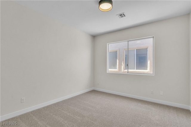 10613 Turquoise Valley Dr, Las Vegas, NV 89144 - empty room with light colored carpet, visible vents, and baseboards