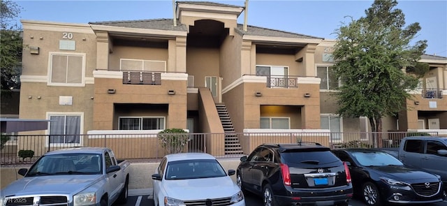 8070 W Russell Rd Unit 1105, Las Vegas, NV 89113 - view of building exterior featuring uncovered parking