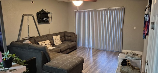 8070 W Russell Rd Unit 1105, Las Vegas, NV 89113 - living room featuring wood finished floors and a ceiling fan
