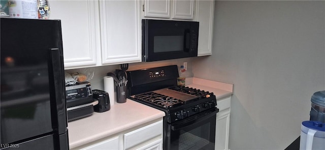 8070 W Russell Rd Unit 1105, Las Vegas, NV 89113 - kitchen featuring black appliances, white cabinetry, and light countertops