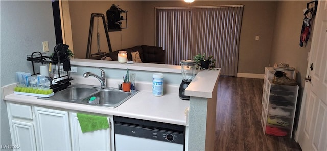 8070 W Russell Rd Unit 1105, Las Vegas, NV 89113 - kitchen featuring dark wood-style flooring, light countertops, dishwasher, and a sink