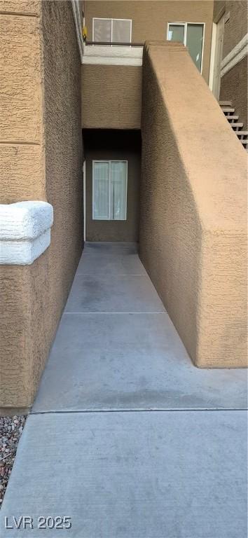 8070 W Russell Rd Unit 1105, Las Vegas, NV 89113 - view of exterior entry featuring stucco siding