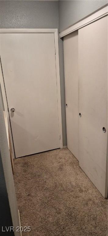 8070 W Russell Rd Unit 1105, Las Vegas, NV 89113 - unfurnished bedroom with a closet and light carpet