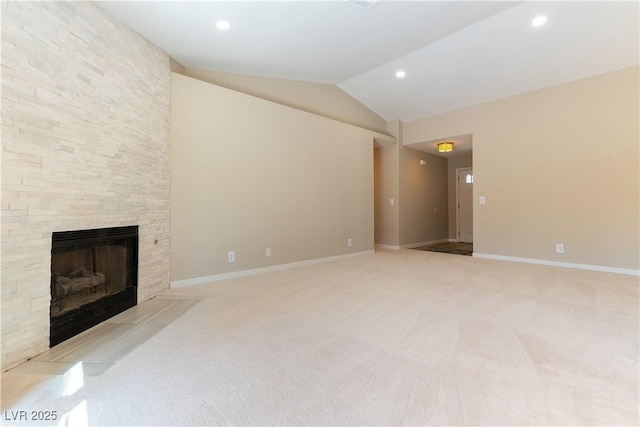 5005 Chambliss Dr, Las Vegas, NV 89130 - unfurnished living room with light carpet, lofted ceiling, a fireplace, recessed lighting, and baseboards