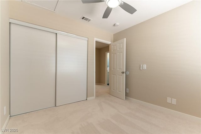 5005 Chambliss Dr, Las Vegas, NV 89130 - unfurnished bedroom with light carpet, a closet, baseboards, and ceiling fan