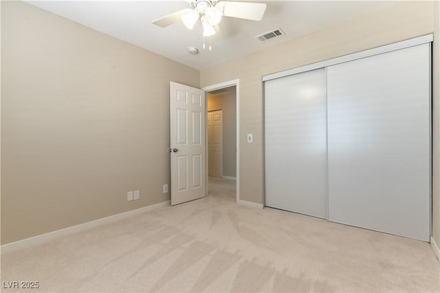 5005 Chambliss Dr, Las Vegas, NV 89130 - unfurnished bedroom featuring light carpet, a closet, baseboards, and ceiling fan