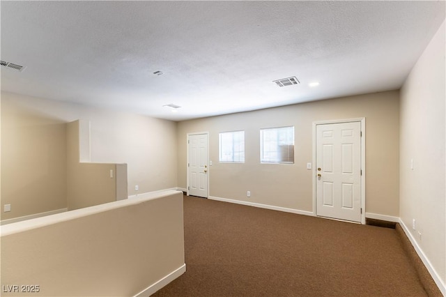 5005 Chambliss Dr, Las Vegas, NV 89130 - unfurnished room with baseboards and dark carpet