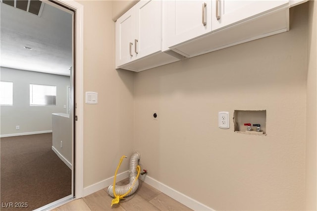 5005 Chambliss Dr, Las Vegas, NV 89130 - laundry room featuring cabinet space, baseboards, washer hookup, and electric dryer hookup
