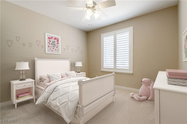 5005 Chambliss Dr, Las Vegas, NV 89130 - bedroom with light colored carpet, baseboards, and a ceiling fan