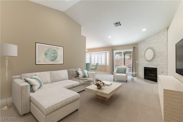 5005 Chambliss Dr, Las Vegas, NV 89130 - living area featuring a fireplace, lofted ceiling, light carpet, baseboards, and recessed lighting