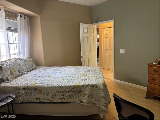 1851 Hillpointe Rd Unit 2621, Henderson, NV 89074 - bedroom featuring baseboards and light wood-style flooring