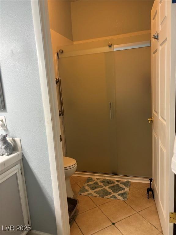 1851 Hillpointe Rd Unit 2621, Henderson, NV 89074 - full bath with vanity, tile patterned floors, toilet, and a shower stall
