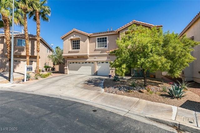 1048 Painted Daisy Ave, Henderson, NV 89074 - traditional-style house with a garage, stucco siding, a tiled roof, and driveway