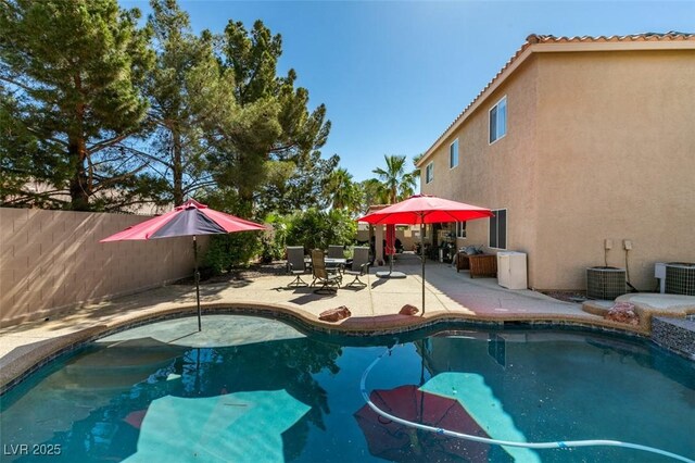1048 Painted Daisy Ave, Henderson, NV 89074 - outdoor pool with a patio