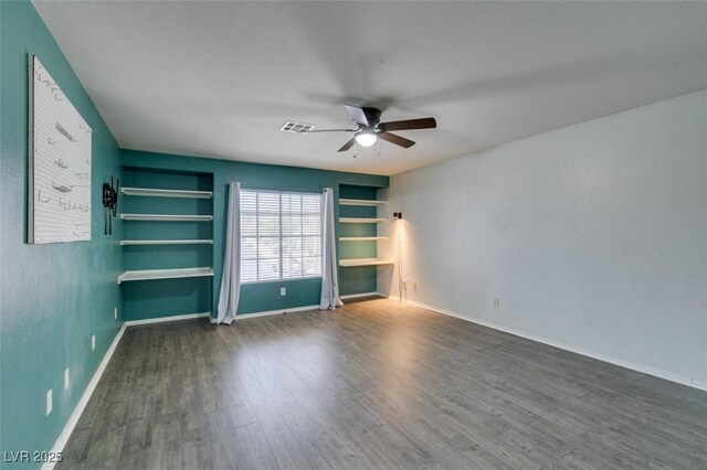 1048 Painted Daisy Ave, Henderson, NV 89074 - unfurnished room with ceiling fan and wood finished floors