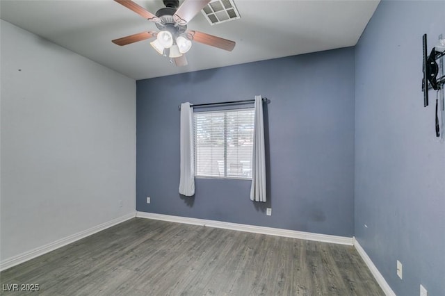 1048 Painted Daisy Ave, Henderson, NV 89074 - empty room with ceiling fan and wood finished floors