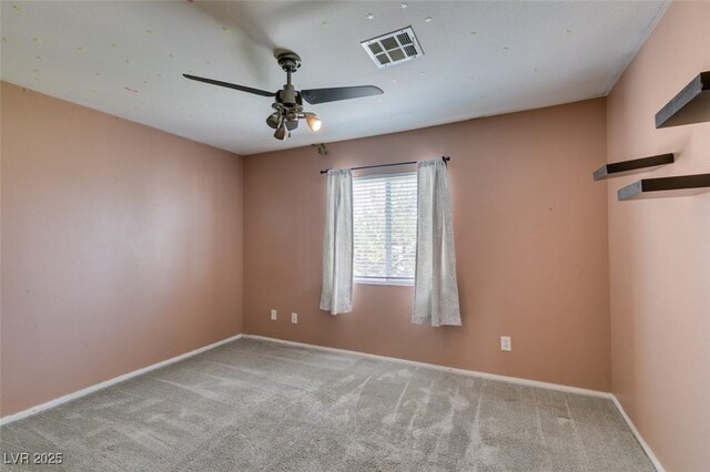 1048 Painted Daisy Ave, Henderson, NV 89074 - empty room with carpet flooring and ceiling fan