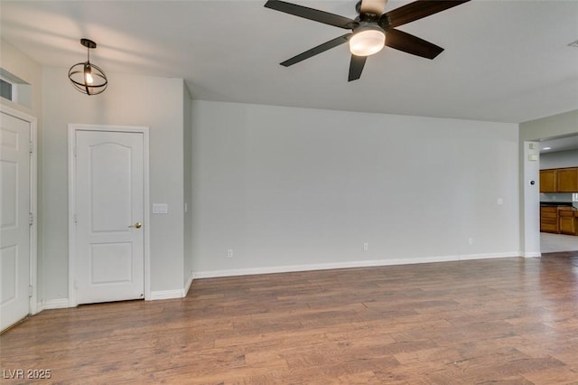 1048 Painted Daisy Ave, Henderson, NV 89074 - unfurnished room with ceiling fan and wood finished floors
