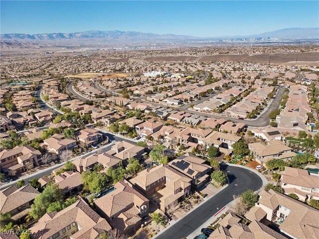 2717 Mona Lisa St, Henderson, NV 89044 - aerial view of property and surrounding area with a mountain backdrop and nearby suburban area