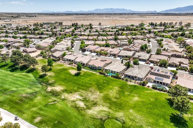 birds eye view of property featuring a mountain view and a residential view
