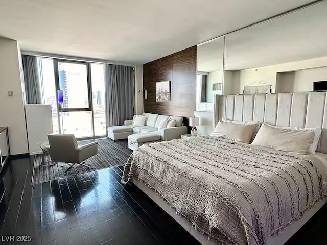 bedroom featuring dark wood-type flooring
