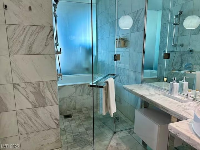 full bathroom featuring a washtub, a stall shower, and tile walls