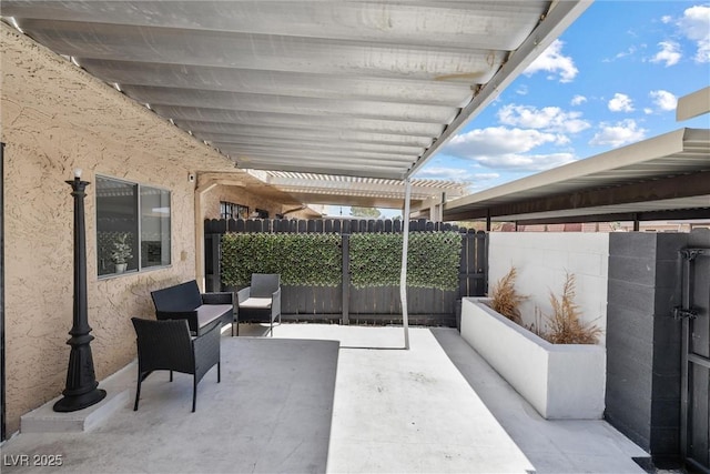 view of patio with fence