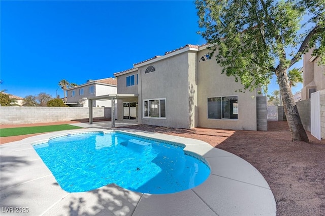 view of pool featuring a fenced in pool, a fenced backyard, and a patio area