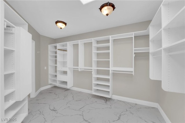 2595 Aviv Ct, Las Vegas, NV 89121 - spacious closet featuring marble finish floor