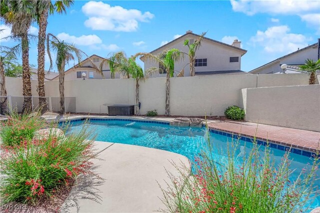2595 Aviv Ct, Las Vegas, NV 89121 - view of swimming pool with a fenced in pool, central AC, and a fenced backyard