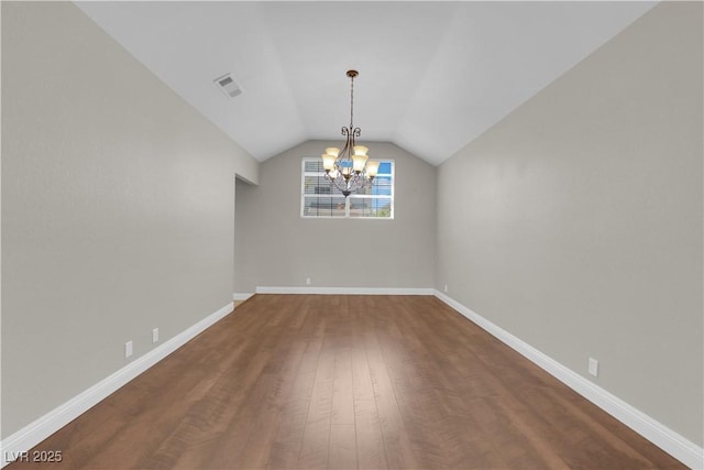 2595 Aviv Ct, Las Vegas, NV 89121 - unfurnished dining area featuring dark wood-style floors, a chandelier, and lofted ceiling
