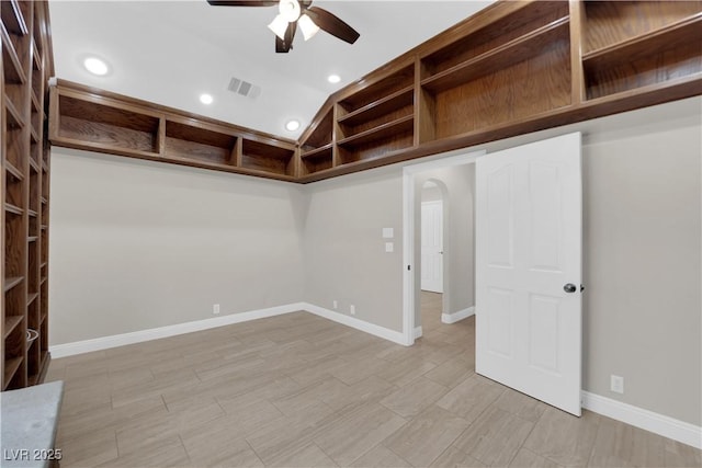 2595 Aviv Ct, Las Vegas, NV 89121 - basement with visible vents, arched walkways, a ceiling fan, and recessed lighting