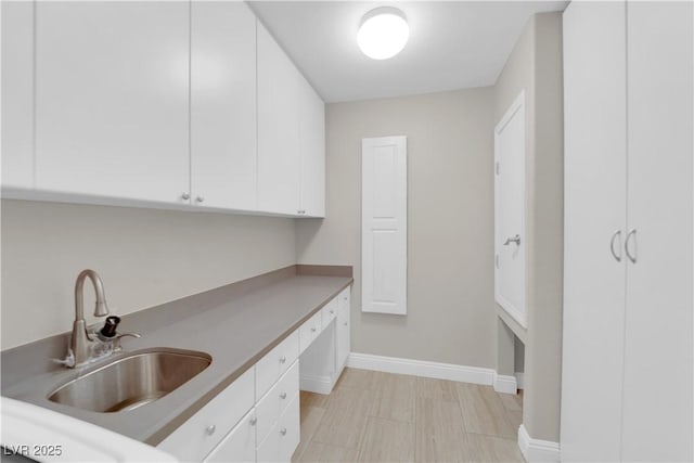 2595 Aviv Ct, Las Vegas, NV 89121 - washroom with baseboards and a sink