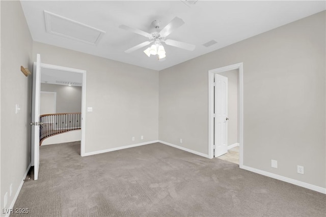 2595 Aviv Ct, Las Vegas, NV 89121 - unfurnished bedroom with attic access, a ceiling fan, carpet flooring, and baseboards