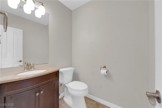 2595 Aviv Ct, Las Vegas, NV 89121 - bathroom with tile patterned floors, vanity, toilet, and baseboards