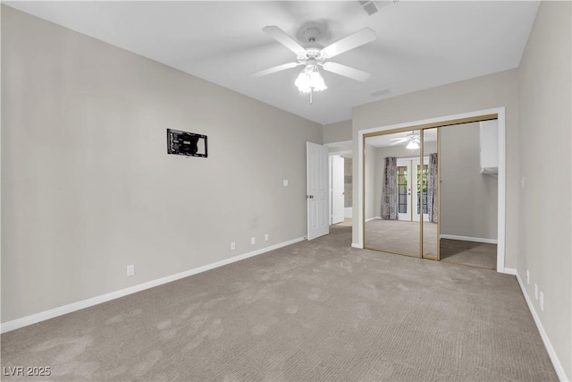 2595 Aviv Ct, Las Vegas, NV 89121 - unfurnished bedroom with baseboards, a closet, french doors, and carpet