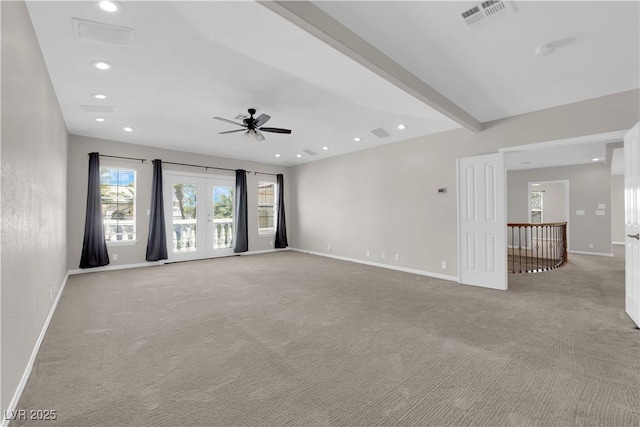 2595 Aviv Ct, Las Vegas, NV 89121 - spare room featuring visible vents, a ceiling fan, baseboards, and light carpet