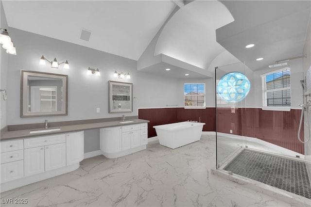 2595 Aviv Ct, Las Vegas, NV 89121 - full bath with a shower stall, vaulted ceiling, and a sink