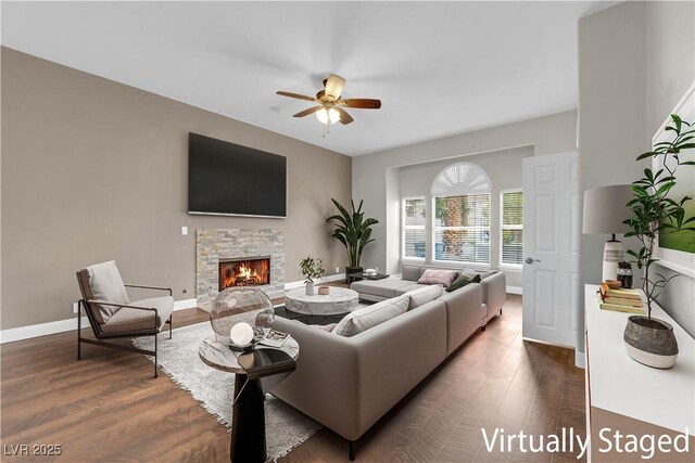 2595 Aviv Ct, Las Vegas, NV 89121 - living room featuring ceiling fan, dark wood-style floors, and a fireplace