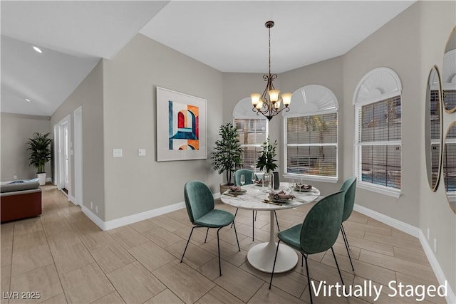 2595 Aviv Ct, Las Vegas, NV 89121 - dining room featuring a chandelier and baseboards