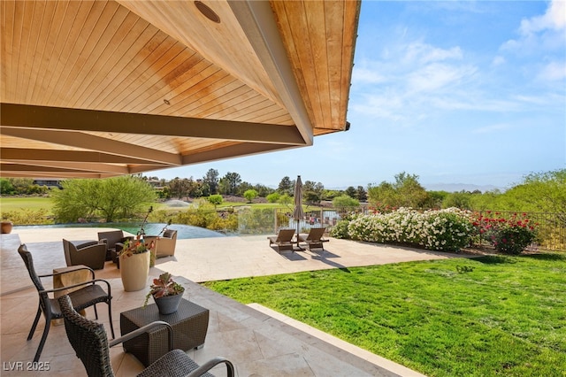 view of patio featuring a water view