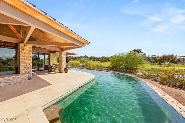 pool featuring a patio area