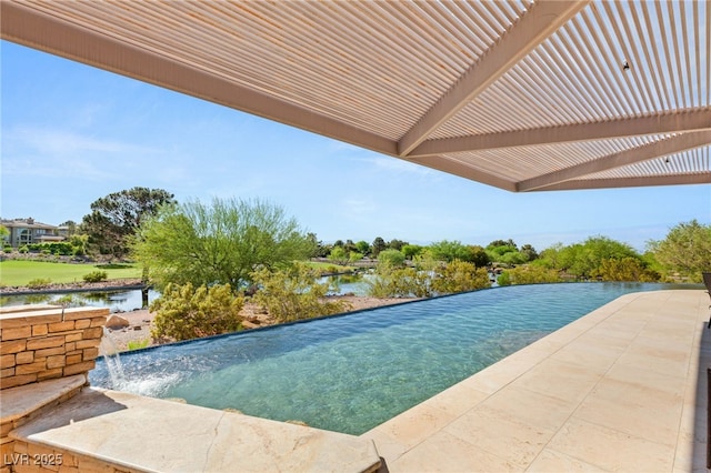 view of swimming pool featuring a water view