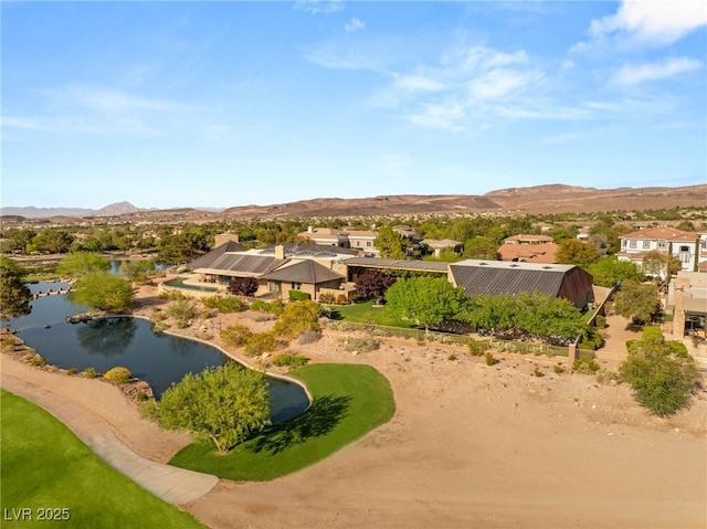 aerial view featuring a residential view and a water and mountain view
