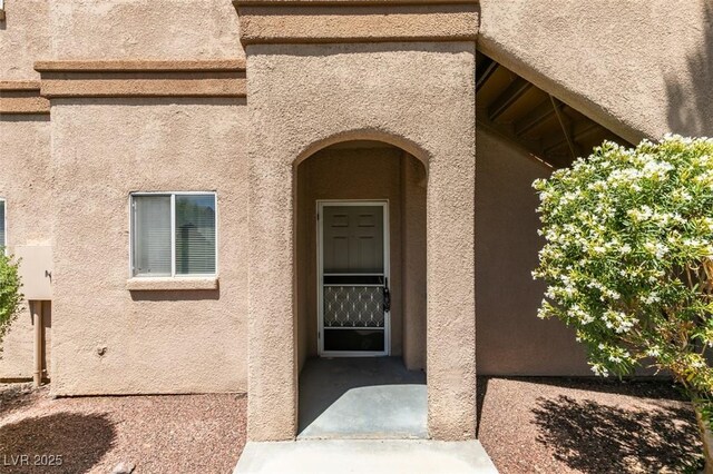 5751 E Hacienda Ave Unit 105, Las Vegas, NV 89122 - view of exterior entry featuring stucco siding