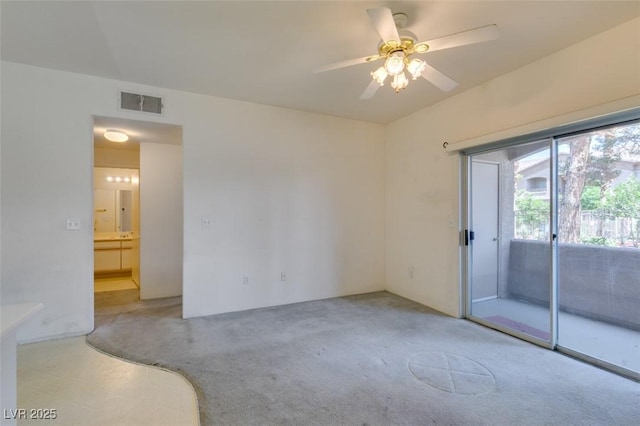 5751 E Hacienda Ave Unit 105, Las Vegas, NV 89122 - empty room featuring a ceiling fan and carpet floors
