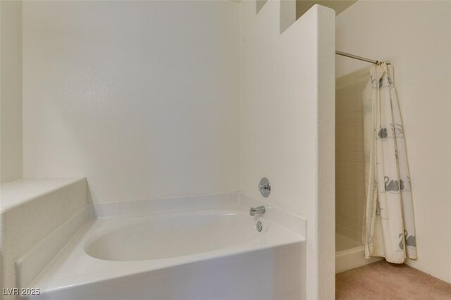 5751 E Hacienda Ave Unit 105, Las Vegas, NV 89122 - bathroom with a bath and a shower with curtain