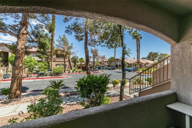 5751 E Hacienda Ave Unit 105, Las Vegas, NV 89122 - balcony featuring a residential view